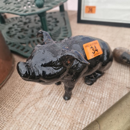 34 - Small Cast Iron Pig