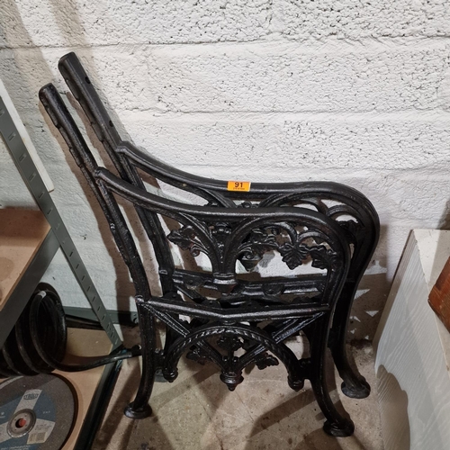 91 - Pair Of Cast Iron Seat Ends