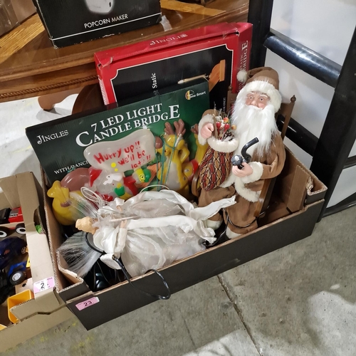 23 - Box Lot Of Christmas Items Inc Candle Bridges, Rocking Santa etc
