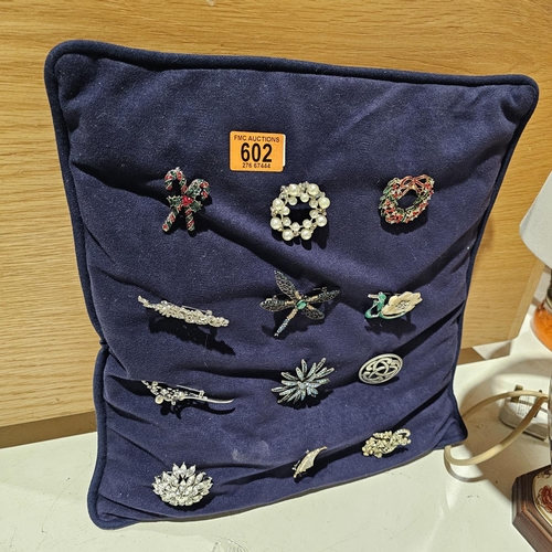 602 - Cushion Of Brooches