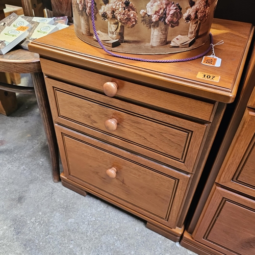 107 - A Small Stage Bedside Cabinet