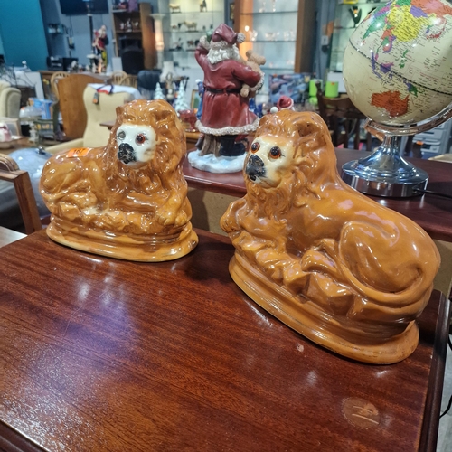 167 - A Pair Of Mantle Lions