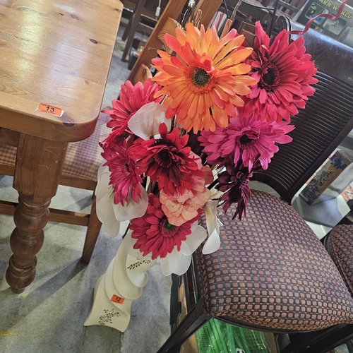 12 - A large Cream Vase With Flowers