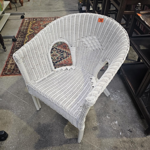 54 - White Wicker Chair