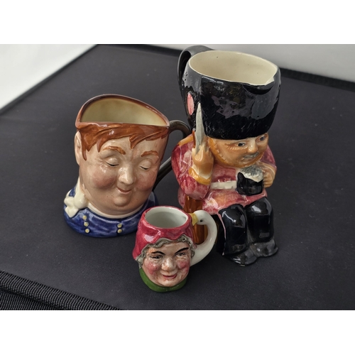 155 - Toby Jug & two Character Jugs. GuardsMan by Shorter & son Ltd, 12cms high, Fat Boy by Royal doulton,... 