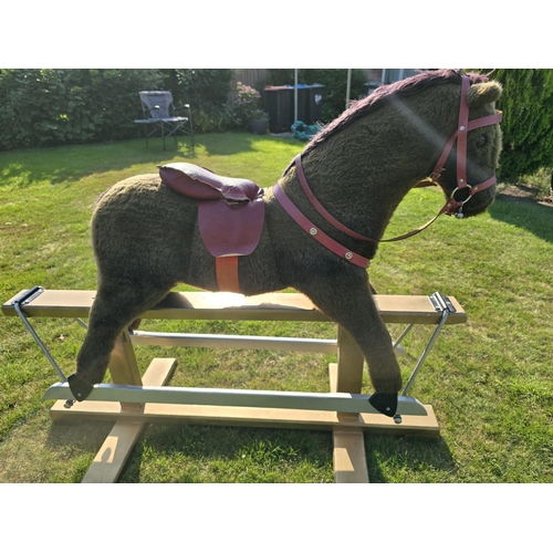 4 - Vintage Rocking Horse. Plush fur covered. Leather padded saddle.Pegasus brand (Crewe). Trestle style... 