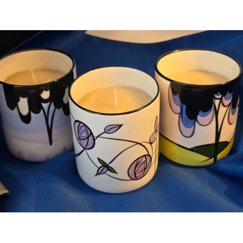 140 - Three quality ceramic candle-holders (with candles) - Hand -painted by Brian Wood Ceramics in Stoke-... 