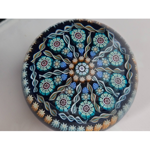 170 - Perthshire paperweight: PP72. Attractive pattern of canes and radial spokes. Translucent blue ground... 