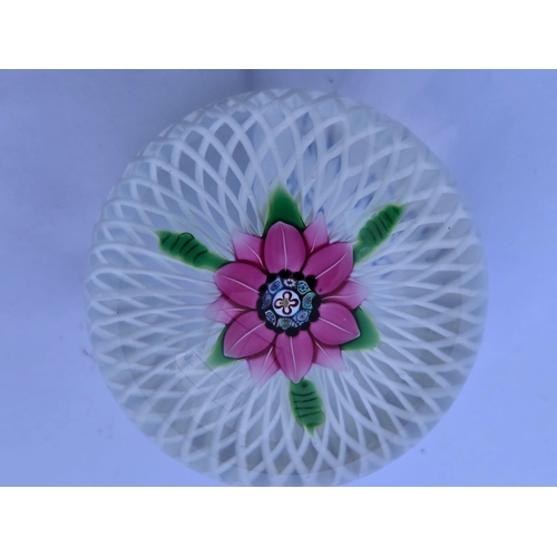 59 - Perthshire paperweights - 1985A Miniature Flower. Pink flower on double spiral latticinio cushion. E... 
