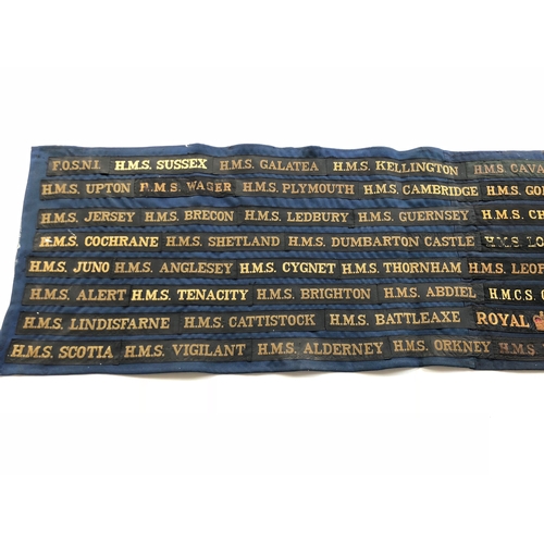 178 - Display of 93 Naval Cap Tallies/Ribbons.  An unusual dark blue cotton panel bearing approx. 93 name ... 