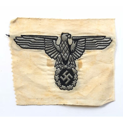 339 - German Third Reich. SS silver wire eagle and swastika from car pennant.  A fine rare rayon Bevo mach... 