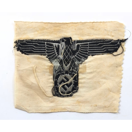 339 - German Third Reich. SS silver wire eagle and swastika from car pennant.  A fine rare rayon Bevo mach... 