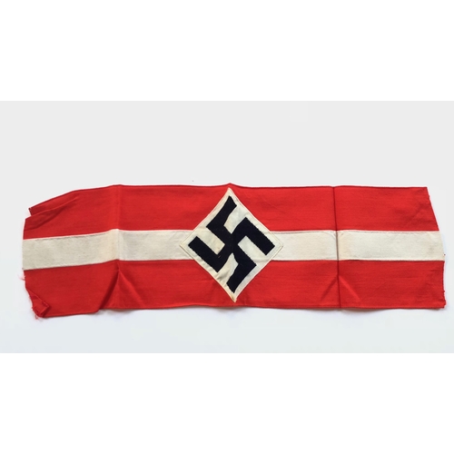 353 - German Third Reich. Hitler Youth Armband.  Good unissued red cotton armband with central white line ... 