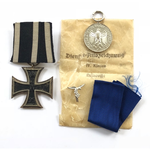 366 - German Third Reich Luftwaffe 4 year Service Medal in packet and an Iron Cross 1914, 2nd Class.  Meda... 