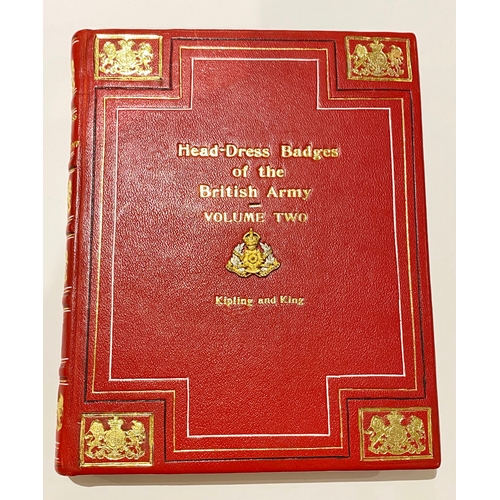 259 - “Head-Dress Badges of the British Army” presentation set.  A very fine pair heavily bound in red lea... 