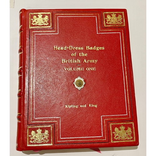 259 - “Head-Dress Badges of the British Army” presentation set.  A very fine pair heavily bound in red lea... 