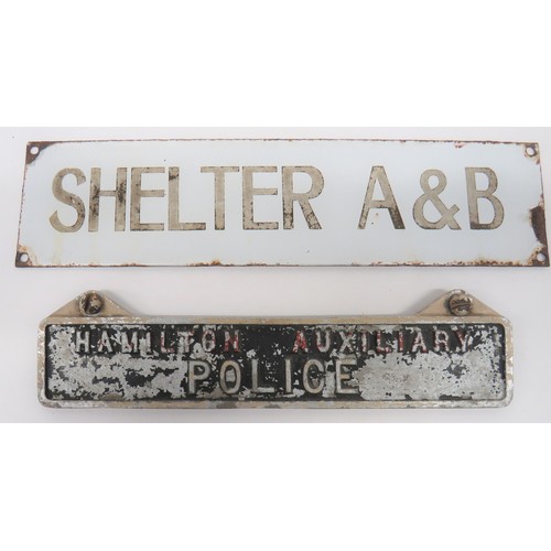 154 - Two WW2 Home Front Signs consisting 12 x 3 inch, white enamel, wall sign with black lettering Shelte... 