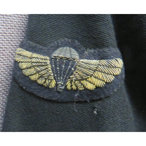 303 - 1952 Dated Officer's Special Air Service Patrol Tunic black, single breasted tunic. Light blue, high... 