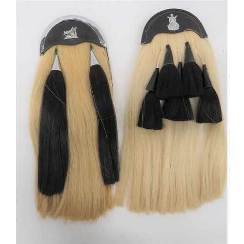 360 - Two Current Scottish Sporrans consisting white horsehair example with five, black horsehair tassels,... 