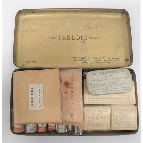 364 - WW1 Period Private Purchase First Aid Kit rectangular, black tin with a red cross to the lid. Interi... 