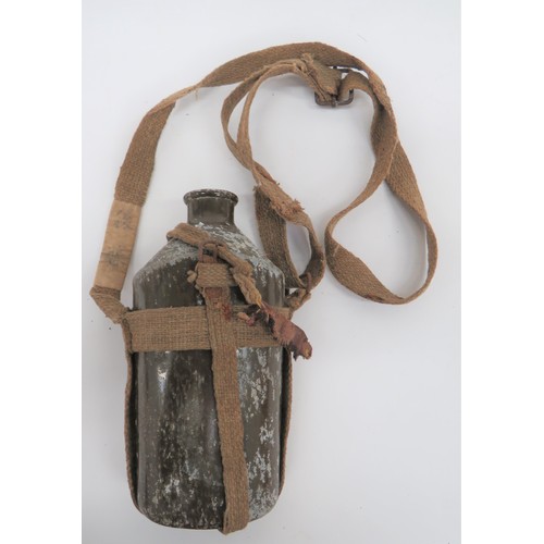 388 - WW2 Japanese Waterbottle brown painted, alloy, cylindrical form waterbottle. Fabric webbing harness ... 