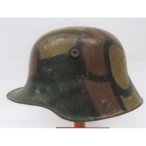 411 - Imperial German Camouflaged Steel Helmet model 1916, grey green painted helmet of typical form. Fiel... 