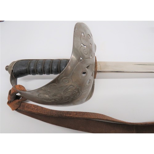 456 - 1897 Pattern Indian Army Issue Officer's Sword 32 3/4 inch, dumb bell blade with central fuller. The... 