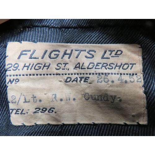 303 - 1952 Dated Officer's Special Air Service Patrol Tunic black, single breasted tunic. Light blue, high... 