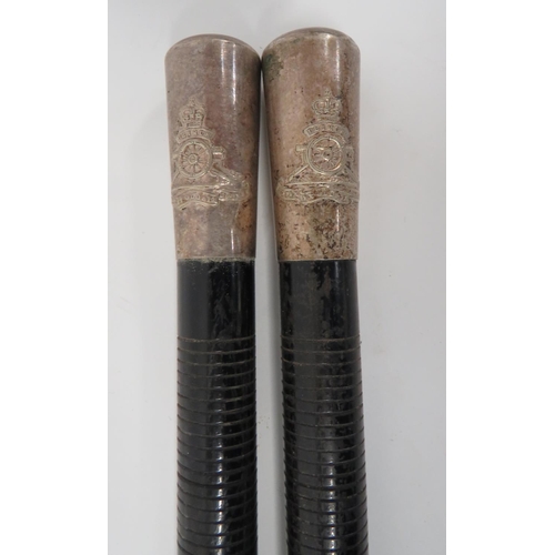 151 - Pair of Post 1953 Ceremonial Drumsticks
blackened wooden drumsticks.  Silvered thimble tops emb... 