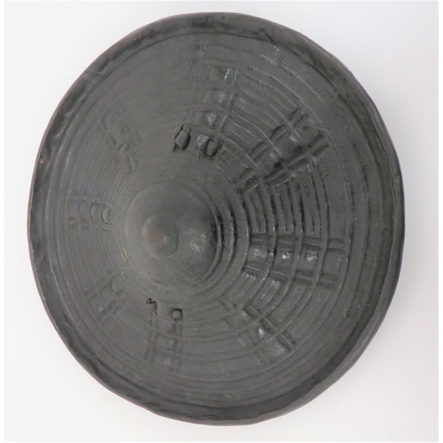 167 - 19th Century Sudanese Buckler Shield
13 inch diameter, hard leather, circular shield.  Roll edg... 