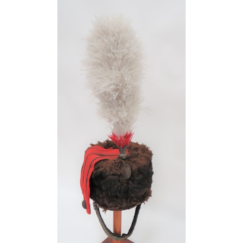 218 - Victorian Cumberland Yeomanry Officer's Busby
dark brown fur, short body with triple silver cord lin... 