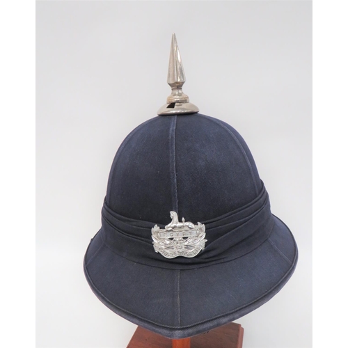 221 - Gloucestershire Regiment Bandsman's Tropical Helmet
blue cotton, six panel crown.  Pointed fron... 