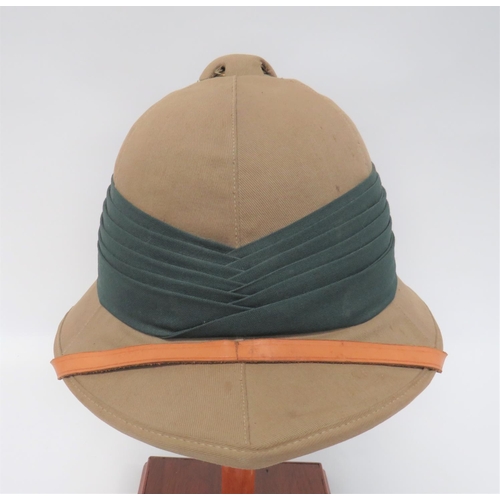 224 - Interwar Tropical Pith Helmet Possibly Rifle Brigade
khaki drill cotton crown.  Pointed front peak a... 