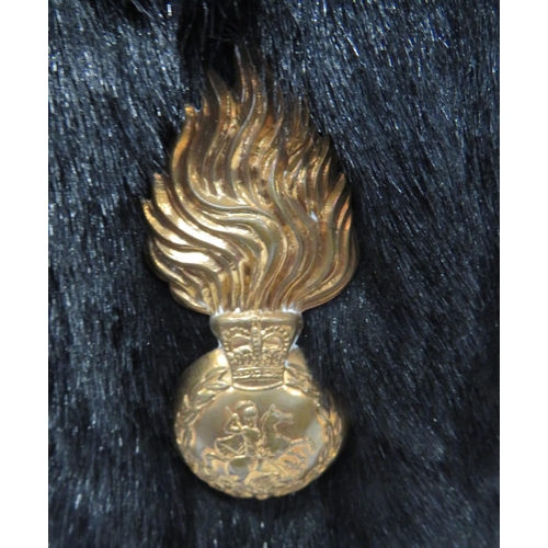 225 - Post 1953 Royal Regiment of Fusiliers Fur Cap
black, short fur busby.  The right side fitted wi... 