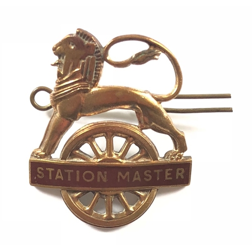 140 - British Railways Western Region Station Master Cap Badge
A brass and enamel example complete with lo... 