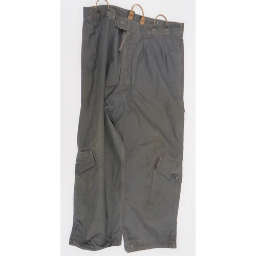 104 - Early 1950's RAF Aircrew Overtrousers
grey, fine canvas, wide leg trousers.  Lower legs with large h... 