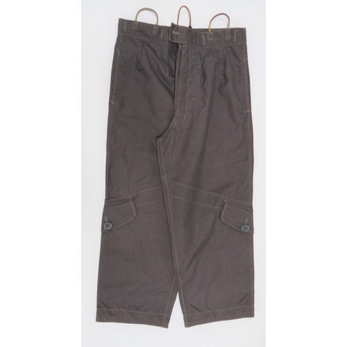 105 - Early 1950's RAF Aircrew Overtrousers
grey, fine canvas, wide leg trousers.  Lower legs with large, ... 