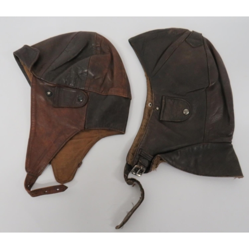 115 - Two WW1 Pattern Flying/Driving Helmets
consisting German style example.  Six panel leather crown wit... 