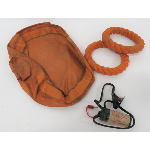 132 - Small Selection of RAF Dinghy Equipment
consisting orange rubber, inflatable disc.  One side with ca... 