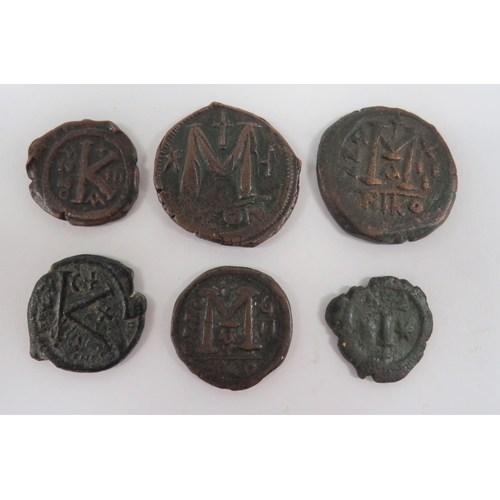 296 - Selection of Byzantine Justin I and II Coins
6 items.
 