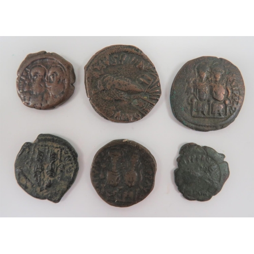 296 - Selection of Byzantine Justin I and II Coins
6 items.
 