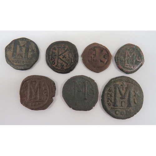 297 - Selection of Byzantine Justinian I Coins
AD 527 - 565.  7 items.