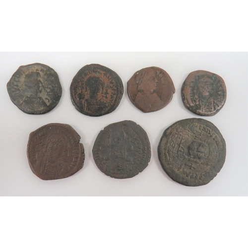 297 - Selection of Byzantine Justinian I Coins
AD 527 - 565.  7 items.