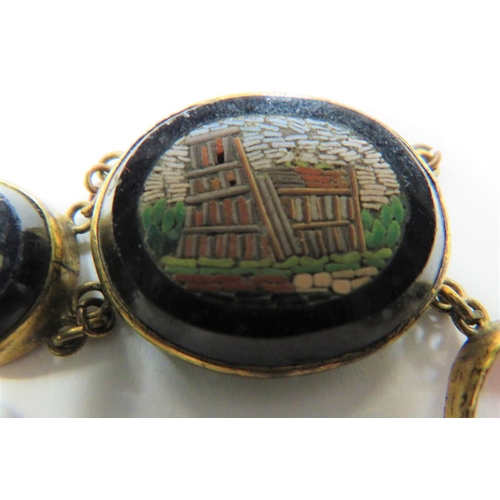 315 - Italian Tour Micro Mosaic Bracelet
gilt bracelet with oval, micro mosaic panes of views of Rome and ... 