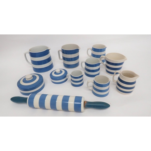 329 - Selection of Blue and White Cornish Ware China
including rolling pin with wooden handles ... 8 x jug... 