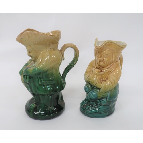 347 - Two Sharpe Brothers Circa 1880 Toby Jugs
green and cream glazed examples consisting a seated Toby wi... 