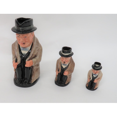 367 - Royal Doulton Sir Winston Churchill Trio Character Toby Jugs.A set of three toby jugs, large, small,... 