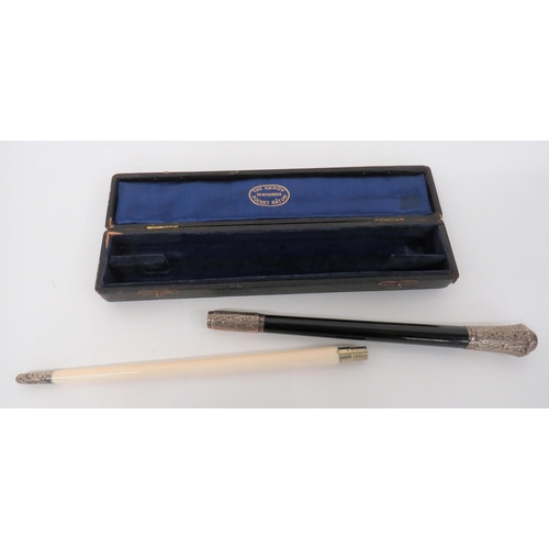 407 - The Handy Pocket Baton. 1902 London hallmarked silver conductor's baton in case. A fine scarce examp... 