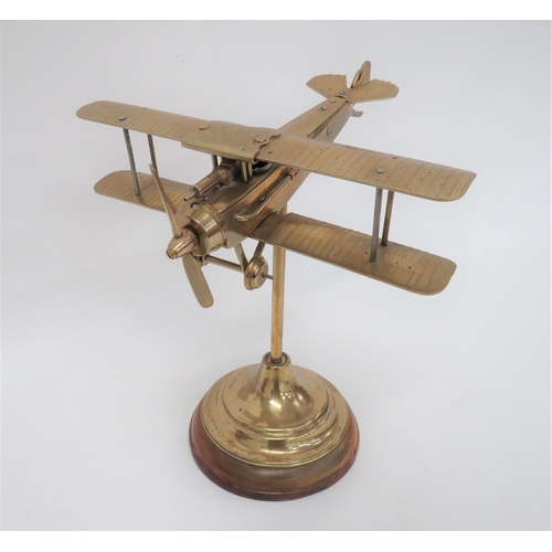 9 - Fine Engineers Model of a WW1 Aircraft
brass and steel model of a German bi-plane.  Working pro... 