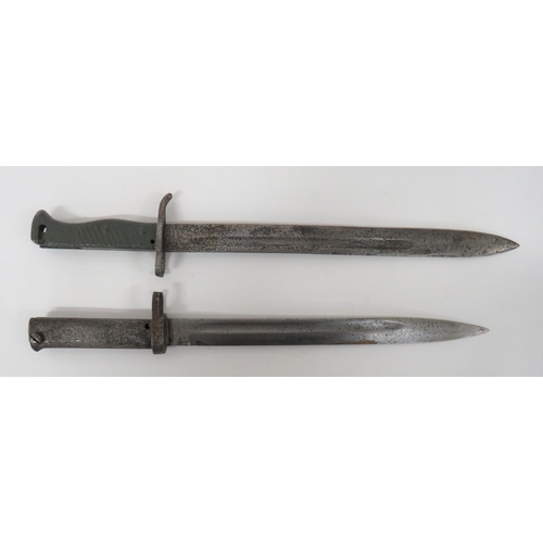 222 - Two Imperial German Ersatz Bayonets
consisting 12 1/2 inch blade example.  Narrow fuller.  Two piece... 